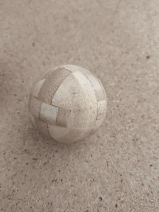 Juego de rompecabezas de metal y madera