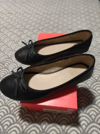 Zapatos planos niña negros con lazo