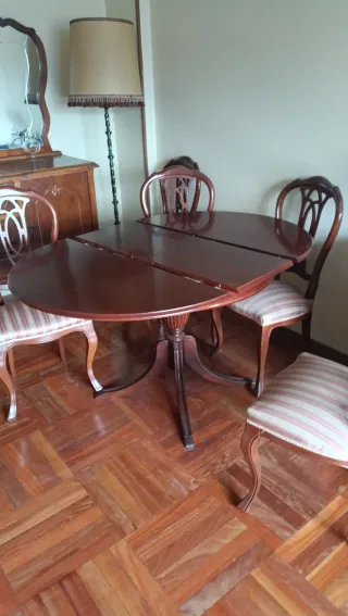 conjunto de mesa extensible redonda y seis sillone