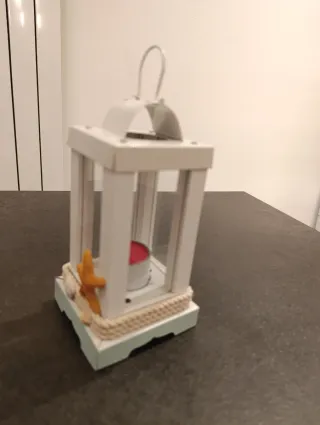 Lanterna decorativa con candela