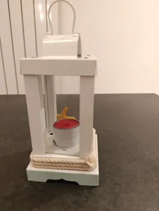 Lanterna decorativa con candela