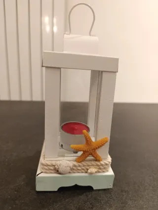 Lanterna decorativa con candela