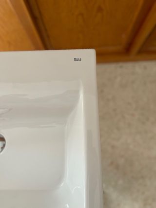 Lavabo con pedestal de cerámica blanco. Marca Roca