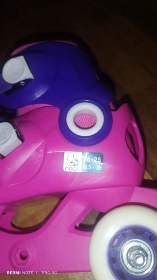 Patines rosas y morados con protecciones
