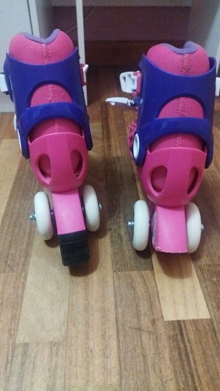 Patines rosas y morados con protecciones
