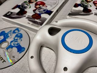 Mario Kart para la consola Wii en su caja+volante
