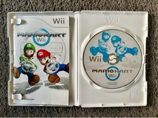 Mario Kart para la consola Wii en su caja+volante