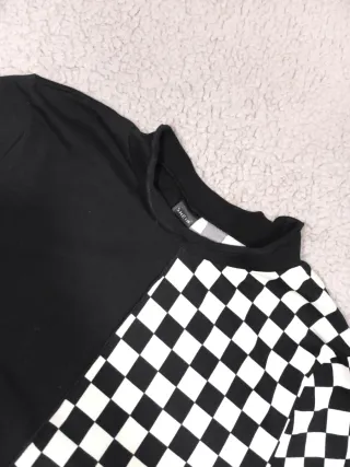 Camiseta manga larga mitad negra mitad a cuadros