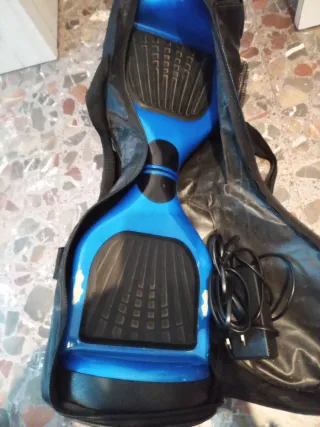 Patin electrico azul con funda