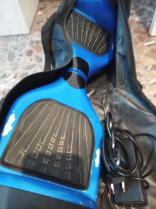 Patin electrico azul con funda