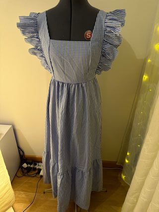 Vestito a quadretti blu e bianchi con frappe