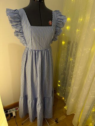 Vestito a quadretti blu e bianchi con frappe