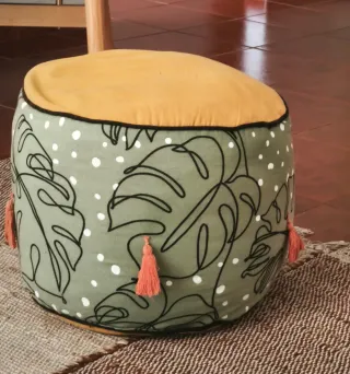 Puf redondo tela hojas y lunares