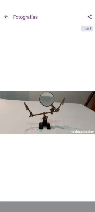 Antigua lupa de joyero