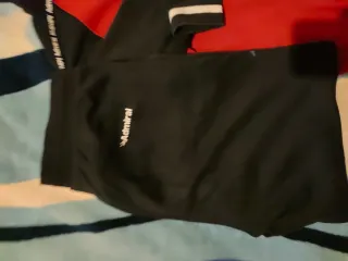 Tuta Admiral uomo rossa e nera