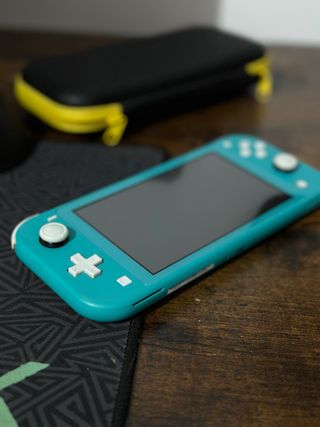 Nintendo Switch Lite + funda