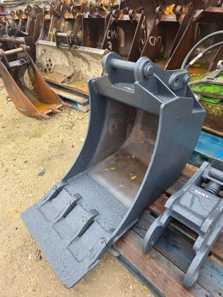 CM21 Cazo mixta Retroexcavadora NH