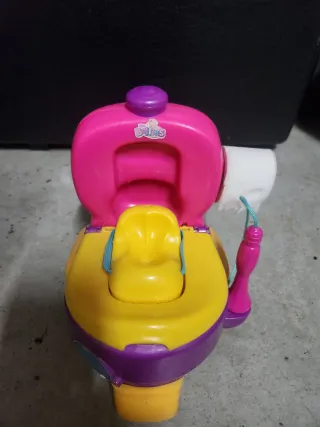 Muñeca Bellie + Potty car