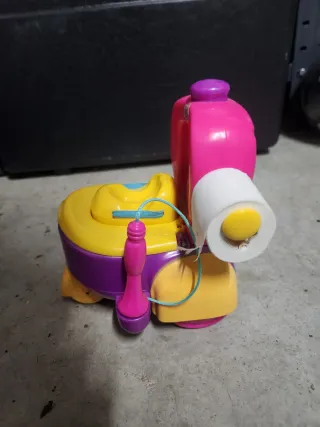Muñeca Bellie + Potty car