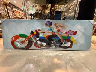 Cuadro pareja motorista multicolor
