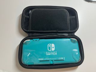 Nintendo Switch Lite turchese con giochi