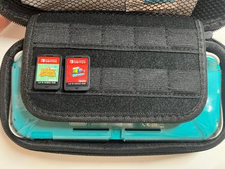 Nintendo Switch Lite turchese con giochi