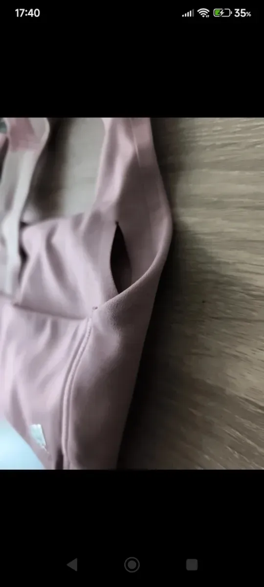 Top deportivo Adidas rosa con 3 rayas