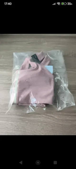 Top deportivo Adidas rosa con 3 rayas