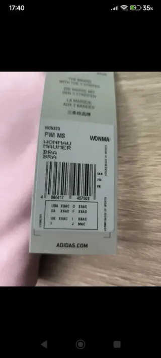 Top deportivo Adidas rosa con 3 rayas