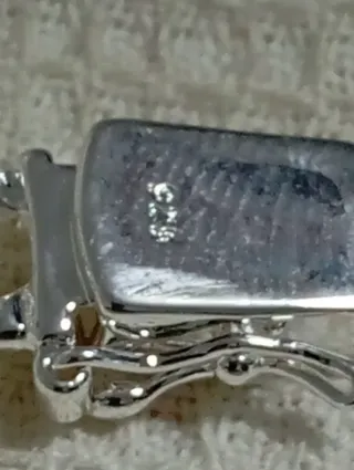 Esclava de plata con placa