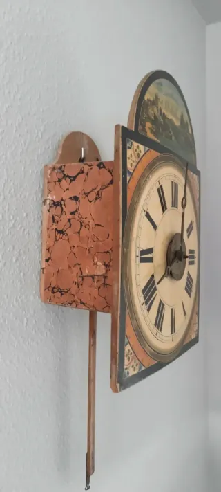 Reloj de pared antiguo pintado a mano