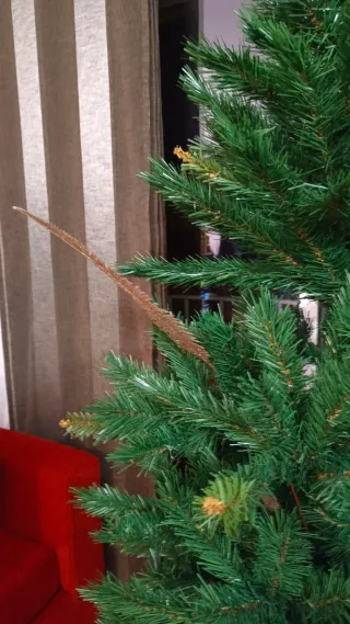 12 Plumas decorativas con purpurina color dorado