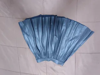 Falda plisada gris niña