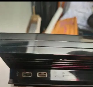 Console PlayStation 3 Nera + Giochi e Accessori