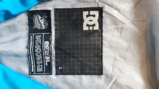 Giacca DC con cappuccio e logo