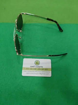 Gafas de Sol Police SPL890V Doradas Verdes