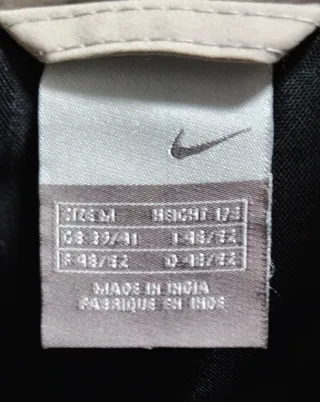 Chaqueta Nike acolchada mujer beige/negra