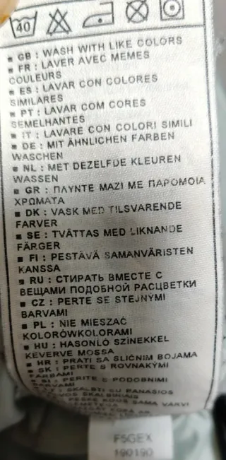 Chaqueta Nike acolchada mujer beige/negra