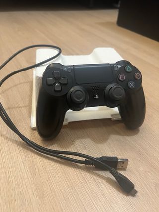 PS4 Slim Nera + Controller + Giochi