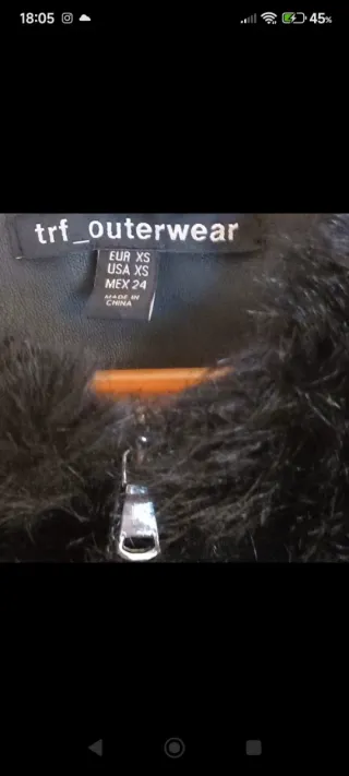 Abrigo de pelo negro