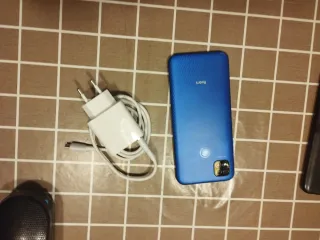 Xiaomi Redmi 9 NFC con cargador y funda