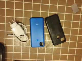 Xiaomi Redmi 9 NFC con cargador y funda