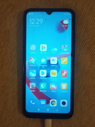 Xiaomi Redmi 9 NFC con cargador y funda