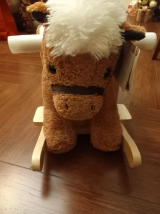 Cavallo a dondolo peluche
