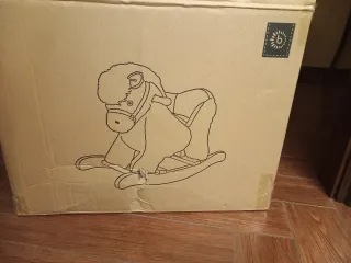 Cavallo a dondolo peluche