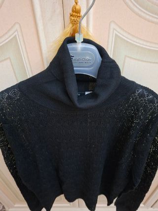 Maglia dolcevita nera in pizzo