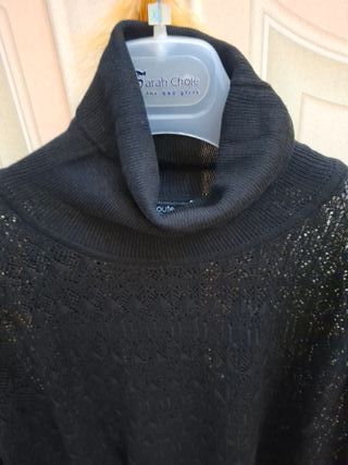 Maglia dolcevita nera in pizzo