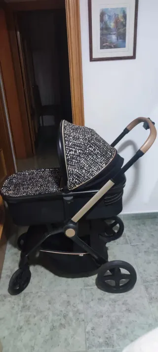 Cochecito bebé negro y beige