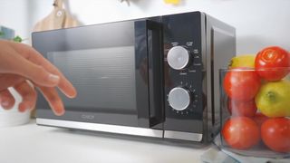 Microondas Candy Moderna con Grill 20L