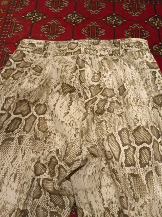 Pantalones estampado serpiente beige y marrón